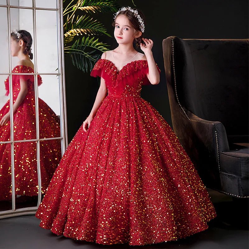 Babelio girls' elegant red sequin prom dress with puffy skirt, modeled in a living room.