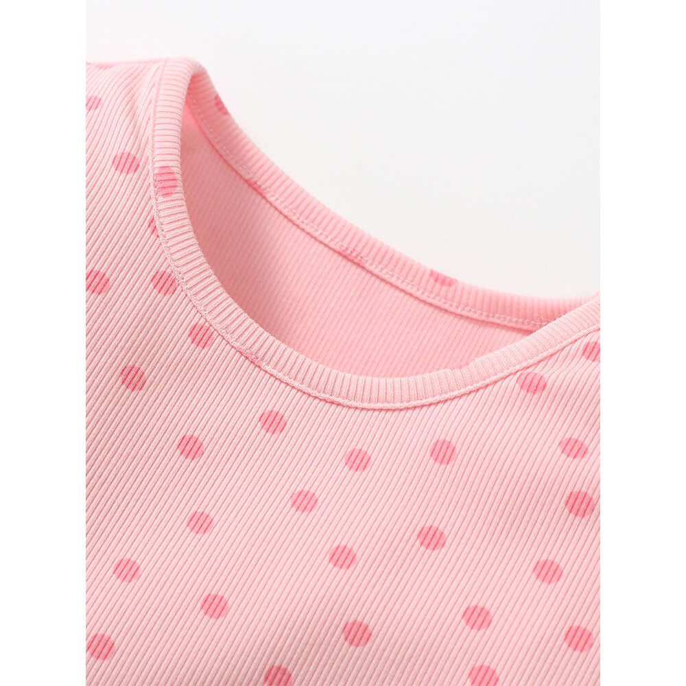 Babelio pink polka dot ribbed baby dress fabric detail, close-up view
