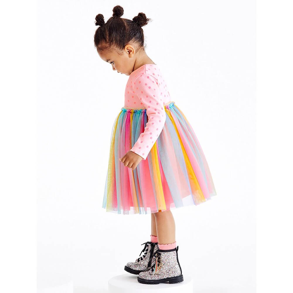 Babelio toddler girl in rainbow tulle dress and glitter boots, studio background