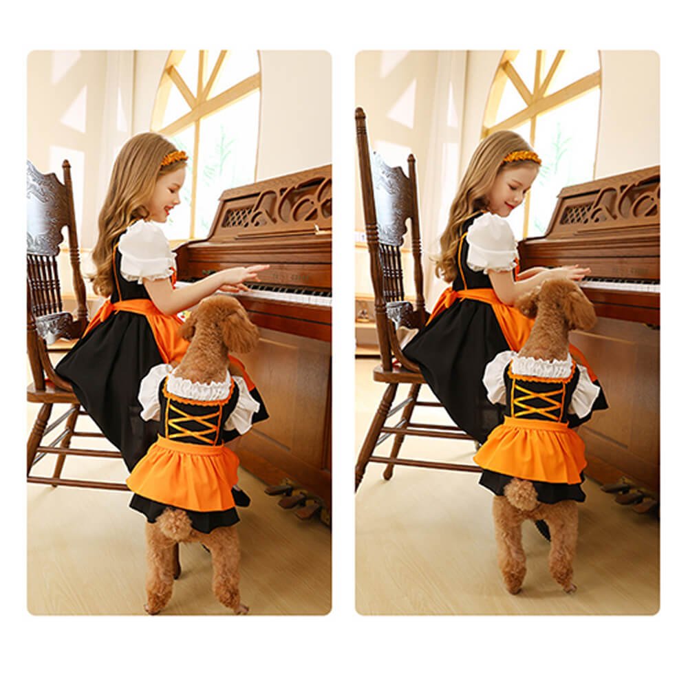 Babelio girl and dog in matching festive costumes by piano in bright living room